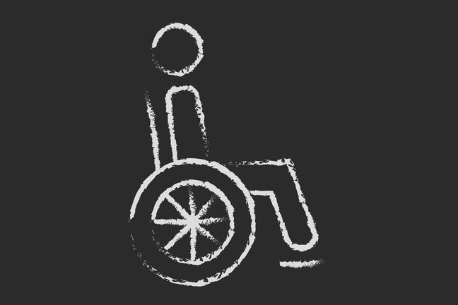 Disabled person icon drawn in chalk.