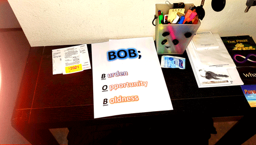 Jeff-Rogas-Pray-for-BOB-desk-at-home_500x